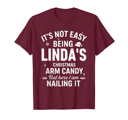 It's Not Easy Being Linda's Christmas Arm Candy But Here T-Shirt